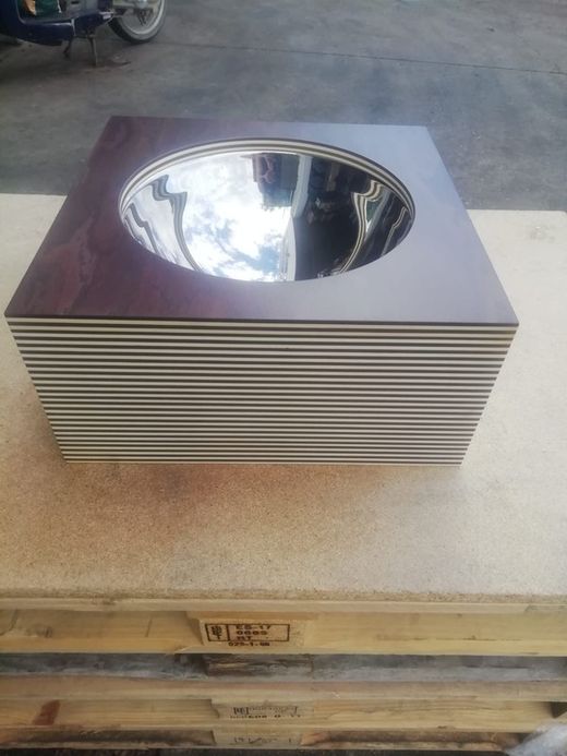 Vasque à poser en acier inoxydable et bois, par Vitra