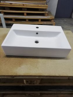 Lavabo suspendu Memento 60x42cm avec porte-serviettes par Villeroy & Boch